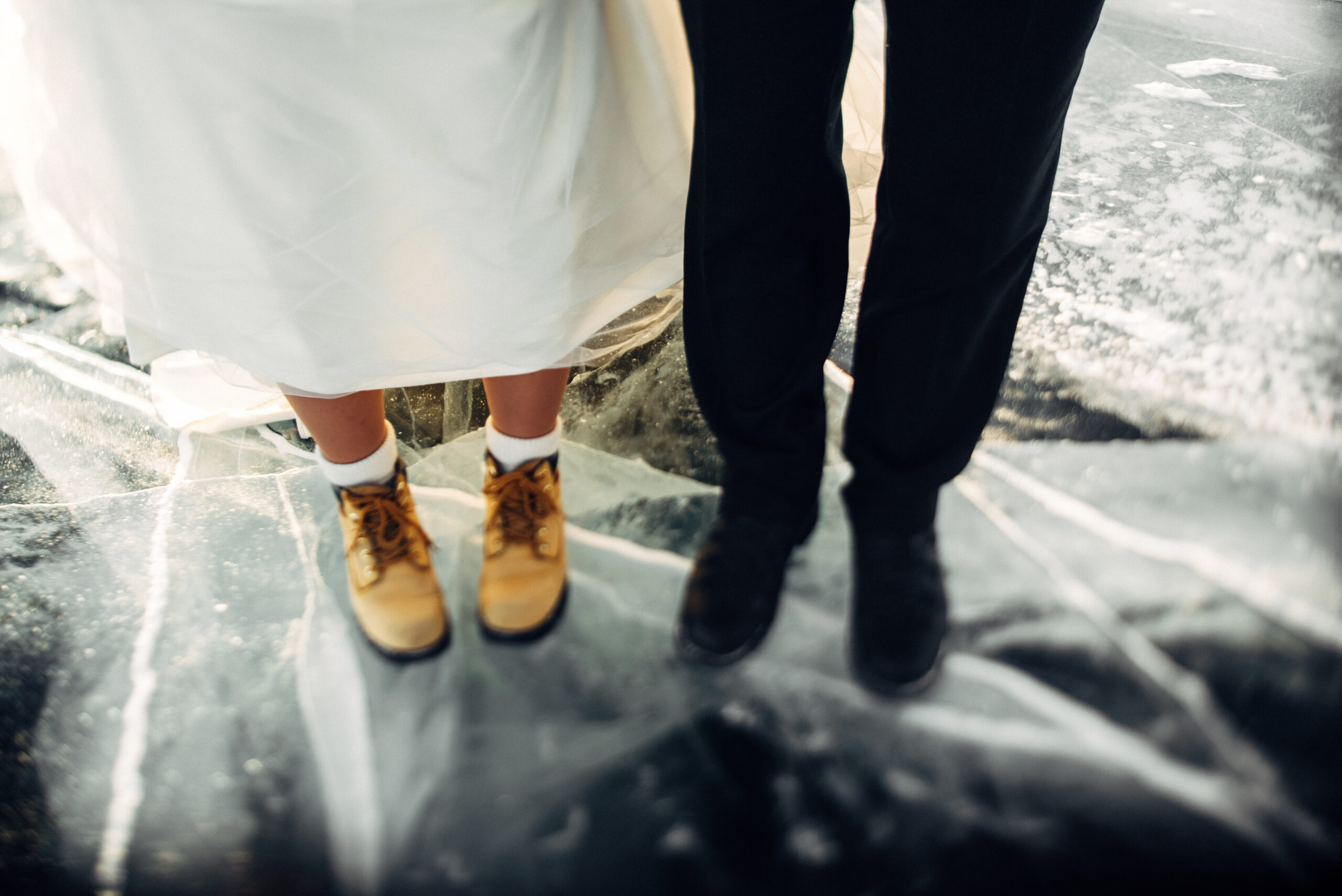 A wedding couple's shoes together before the ceremony
