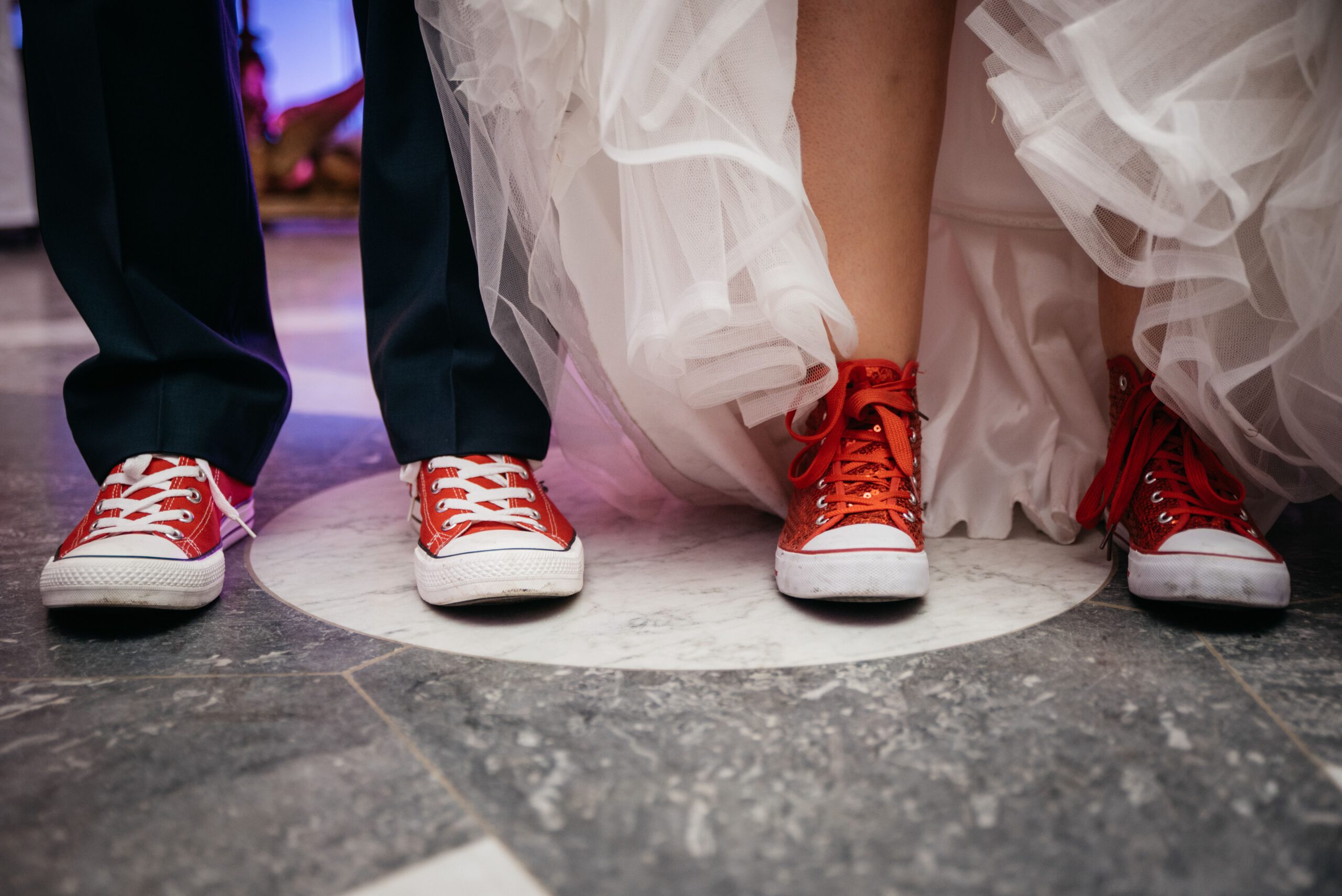 Bride and groom standing side by side on their wedding day