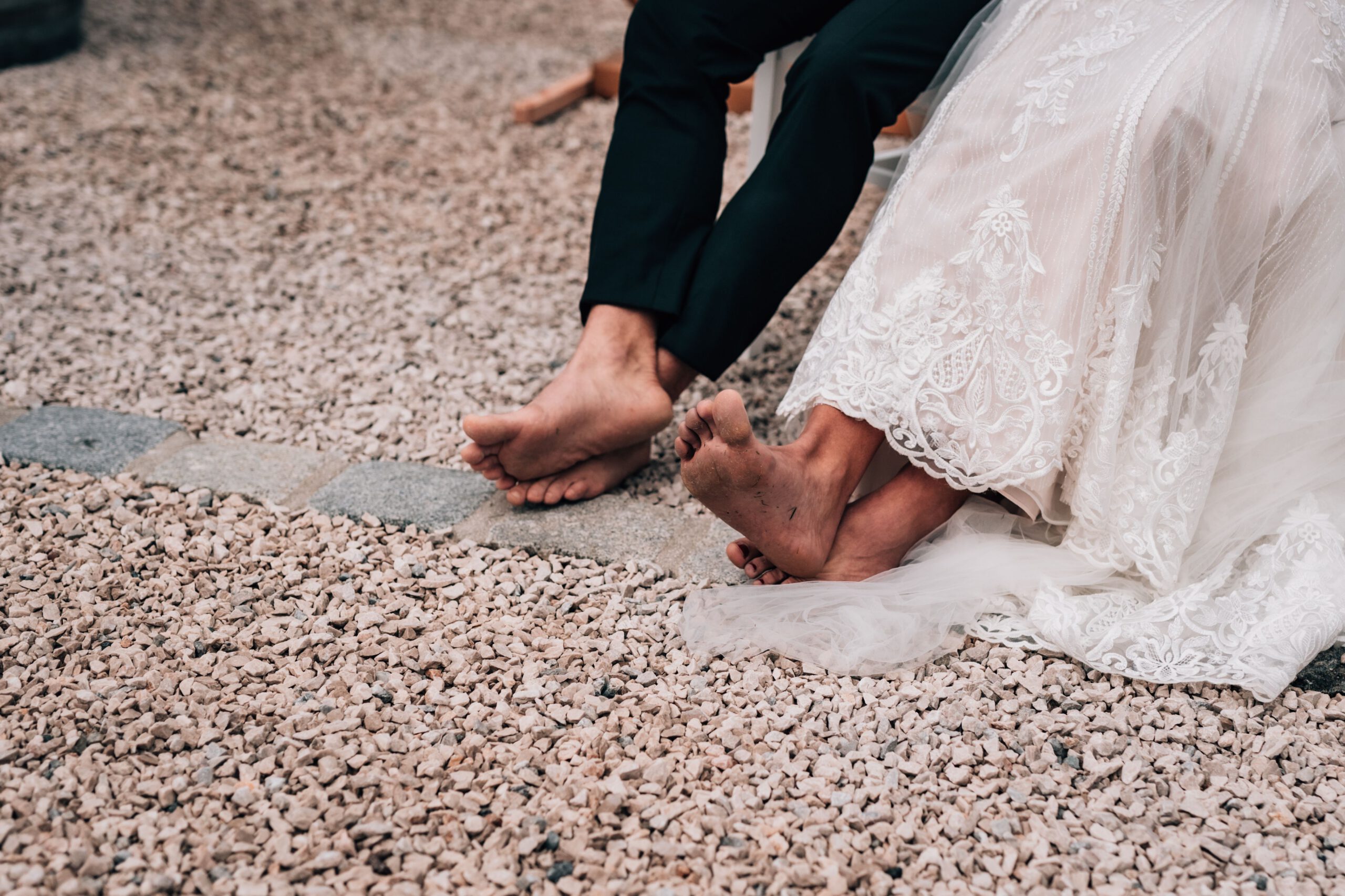 Close-up of a couple's feet on their wedding day