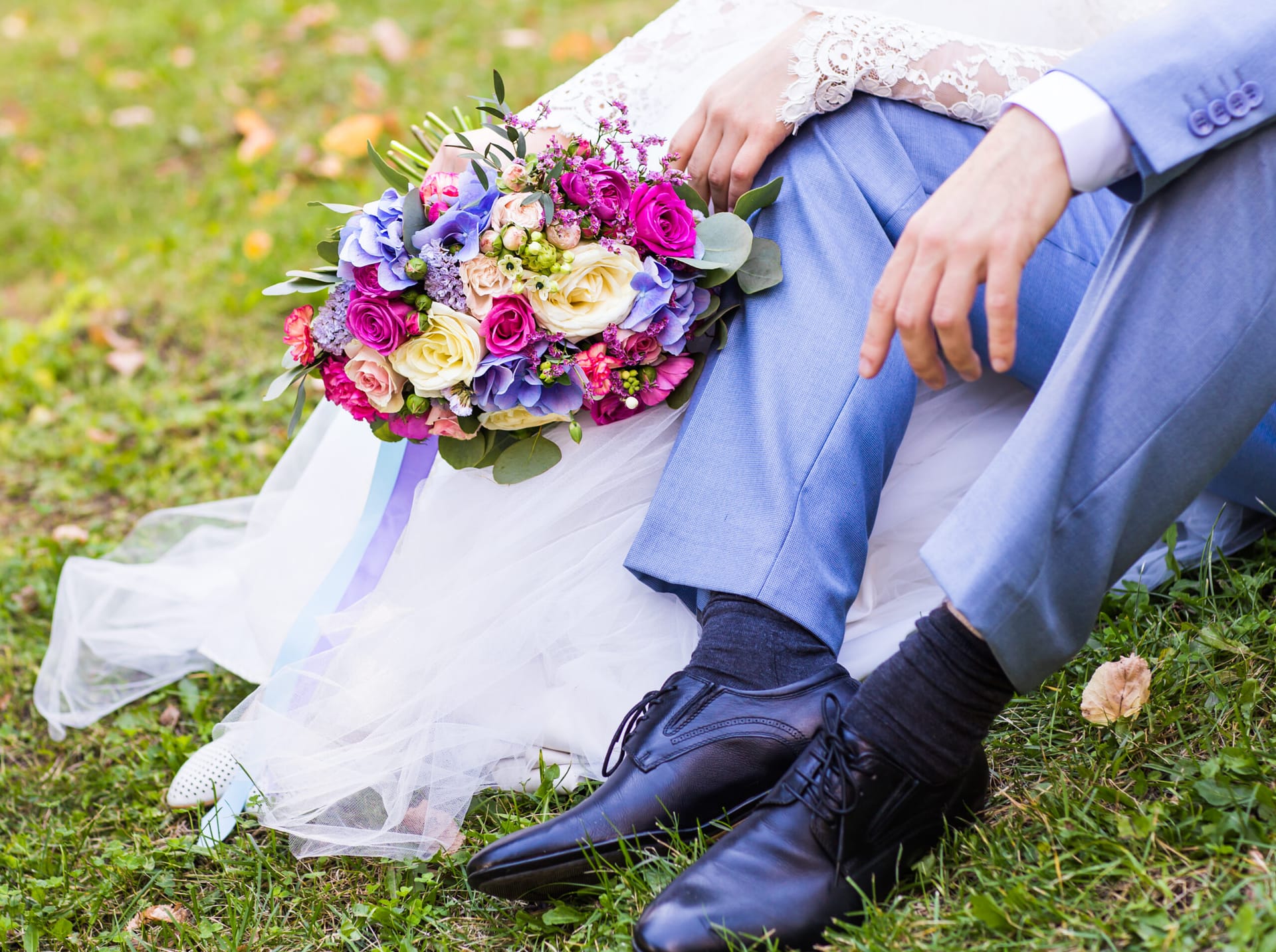A couple outdoors on their wedding day